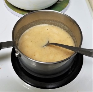 A pan of hot cereal on the stove.