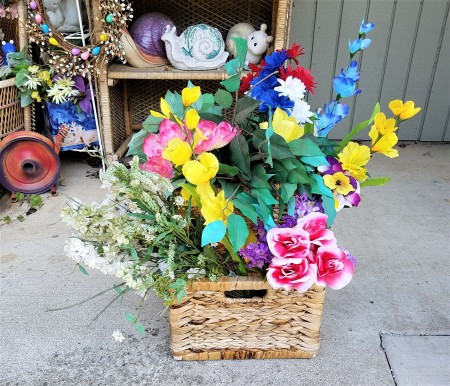 Double Decker Wicker Baskets Floral Display - first try with an abundant floral display the actually hides the smaller basket