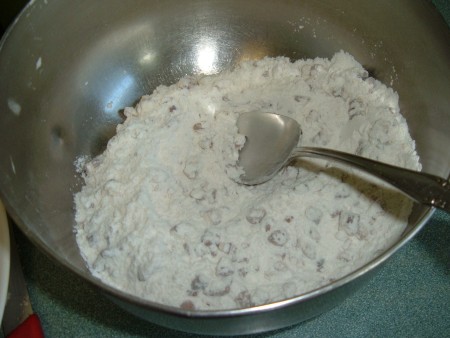 The dry ingredients for banana bread in a bowl.