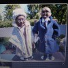 Buying Milton Porcelain Doll Shoes? - photo on computer screen of male and female African American Dolls