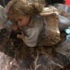Value of a Cathay Porcelain Doll? - doll on stone countertop