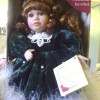 Identifying a Collector's Choice Porcelain Doll? - doll in blue velvet dress with fluffy white trim, in the original box