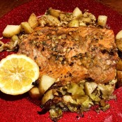 A finished plate of garlic butter salmon.