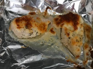 Cooked mayo-parmesan chicken breasts.