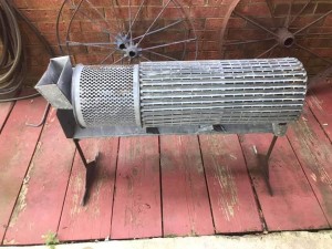 Identifying Antique Farm Equipment? - old galvanized cylinder on legs with a crank handle and a rectangular box where something could be added
