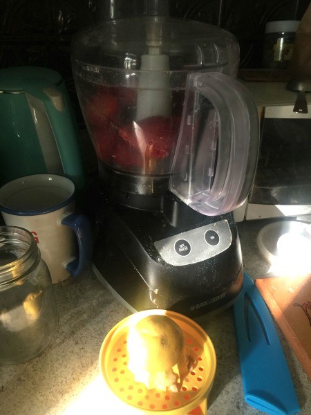 Blending strawberries for the pie.