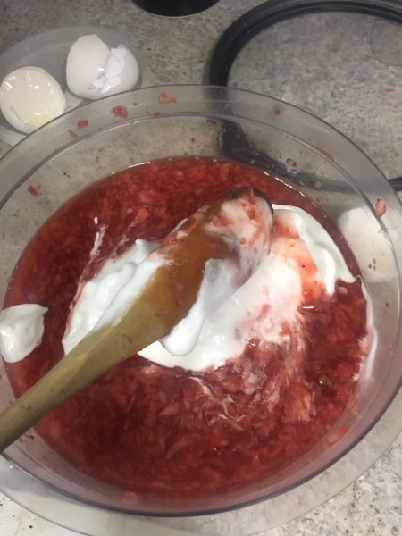 Strawberry chiffon mixture in a bowl.