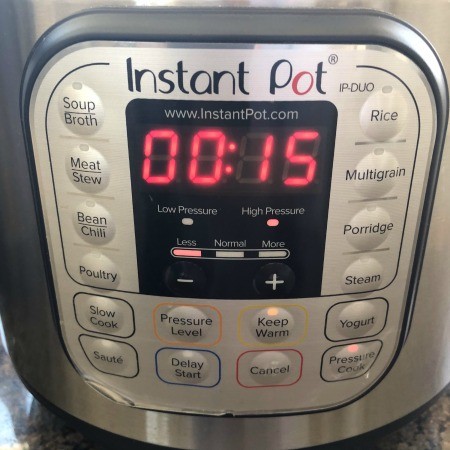 An Instant Pot set for 15 minutes.