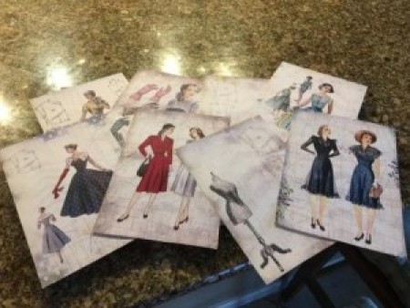 Sew Pretty Sewing Machine Restoration - printouts of vintage sewing pattern envelopes