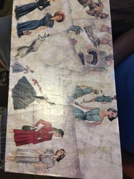 Sew Pretty Sewing Machine Restoration - shelf decoupaged with pattern printouts