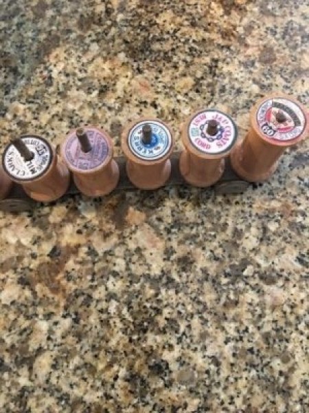 Decorated Singer Button Box and Spool Holder - spools on dowels with the labels glued in place