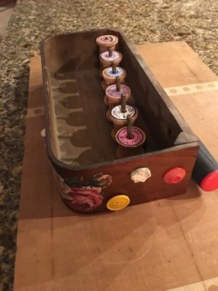 Decorated Singer Button Box and Spool Holder - drawer from one end showing spools, decoupage, and buttons