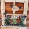 Decorative Junk Wood Window Frame - scarp shipping wood packaging made into a window with a flowerbox decoration