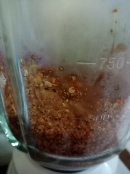 A mixture of dried chili peppers in the blender.