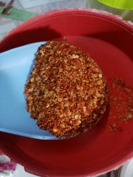 A scoop of chili powder.