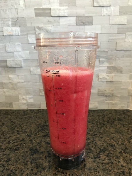 The blended watermelon strawberry beverage.