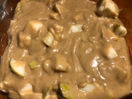 The unbaked cake in a pan.