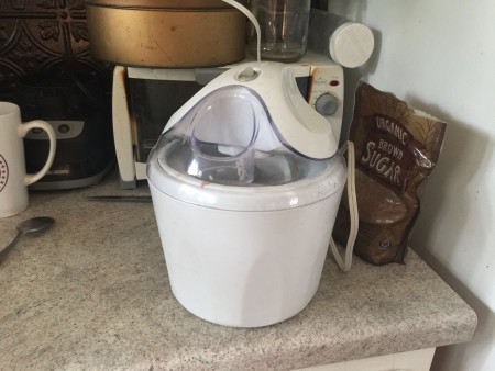 An ice cream maker on the counter.