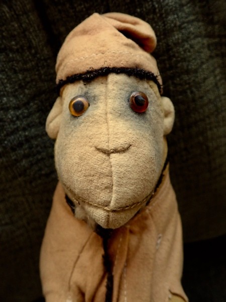 A vintage toy monkey.