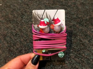DIY Earbuds Holder - buds secured to card