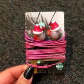 DIY Earbuds Holder - buds secured to card