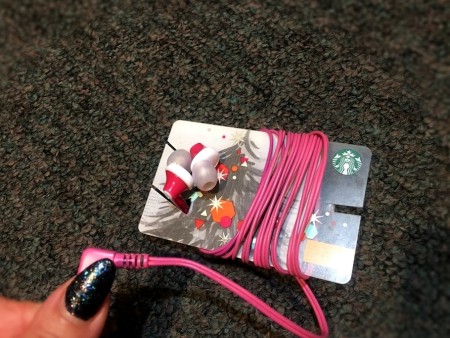 DIY Earbuds Holder - buds inserted into the slits, cord wrapped around the card