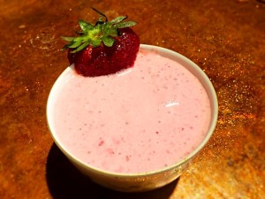 A bowl of vegan strawberry mousse.