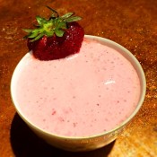 A bowl of vegan strawberry mousse.