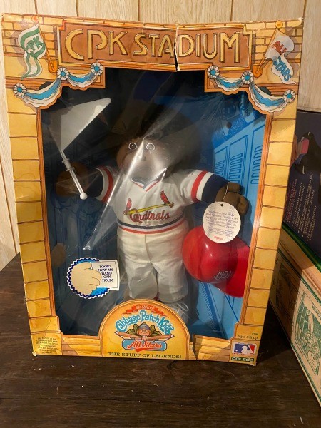 A Cabbage Patch doll in the box.