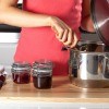 A woman making jam.