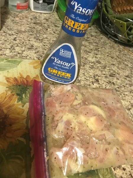 Marinating the chicken.