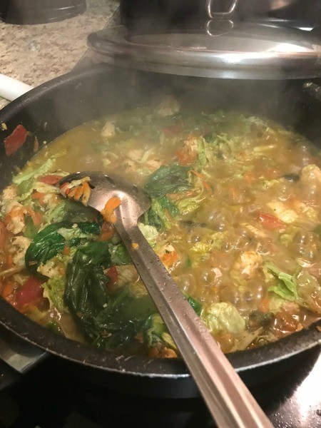 Cooking the chicken mixture.