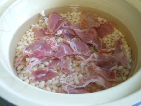 Ham and beans in a crockpot.