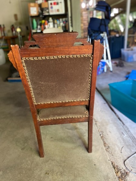 The back of an antique chair.