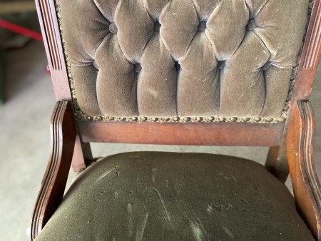 The back of an antique chair.