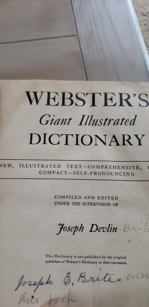 The title page of an old Webster's dictionary.