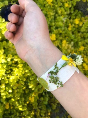 Nature Collection Bracelets - tape on wrist covered with flowers and leaves