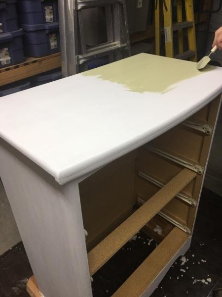 Decalicious Dresser Makeover - applying paint over the primer
