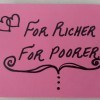 A card that says "For Richer, For Poorer" on pink paper