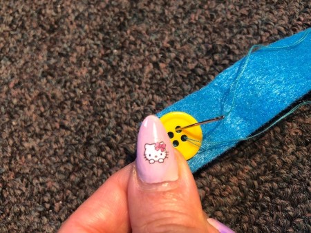 DIY Ear Saver and Mask Extender - sewing on a button