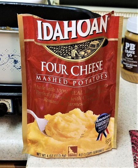 A package of four cheese mashed potatoes.