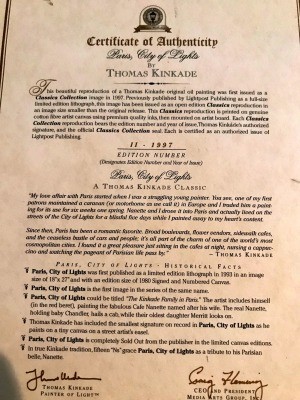 A certificate of authenticity from Thomas Kinkade.