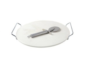 A pizza stone with a pizza cutter on top.