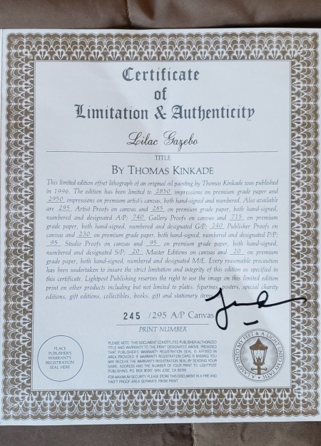 A certificate of limitation and authenticity from Thomas Kinkade.