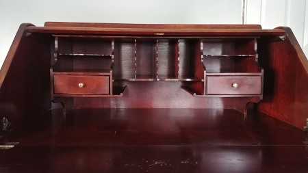 An open wooden desk.