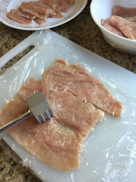 Pork pounded flat with a meat tenderizer.