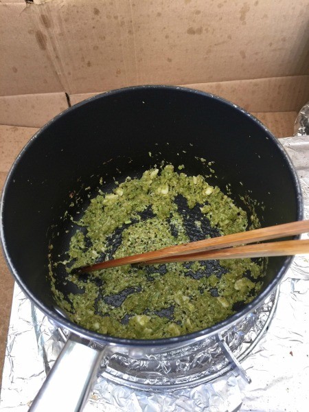 Cooking the lemongrass in a pot.