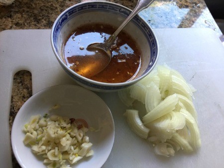 Chopped garlic, onion and fish sauce.