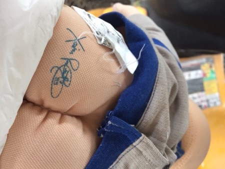 The signature on a Cabbage Patch doll.