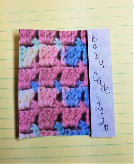 A pattern for a baby blanket with a white tab added.